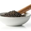 Freshly ground unadulterated Wayanad black peppercorn in a bowl