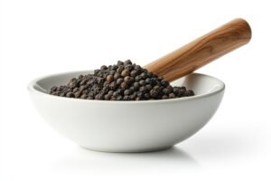 Freshly ground unadulterated Wayanad black peppercorn in a bowl