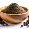 Premium whole Wayanad black peppercorns before the grinding process