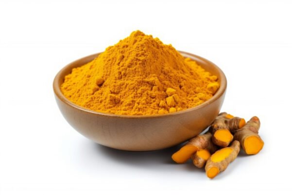 Freshly ground unadulterated turmeric powder in a bowl displaying natural golden color